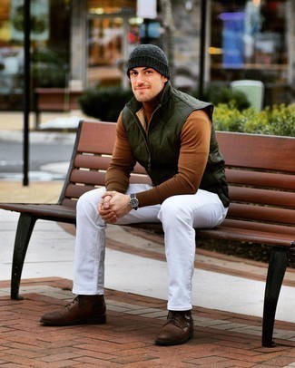 Dark Green Quilted Gilet Outfits For Men: If you prefer laid-back combos, then you'll appreciate this pairing of a dark green quilted gilet and white jeans. And if you need to easily up your look with one single item, why not introduce a pair of dark brown leather casual boots to the equation?