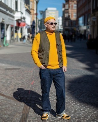 Mustard Knit Turtleneck Outfits For Men: A mustard knit turtleneck and navy jeans are the kind of a foolproof casual getup that you so awfully need when you have zero time. To bring out the fun side of you, add mustard athletic shoes to the equation.