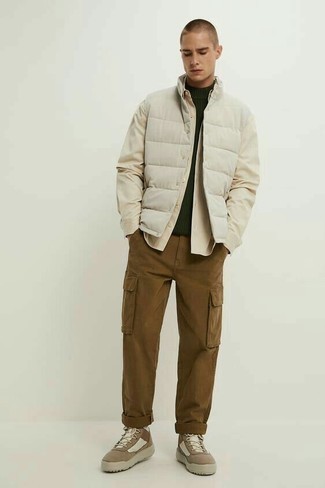 Brown Corduroy Chinos Outfits: Want to inject your menswear arsenal with some effortless dapperness? Dress in a white quilted gilet and brown corduroy chinos. Brown leather high top sneakers will give a more laid-back twist to an otherwise traditional getup.