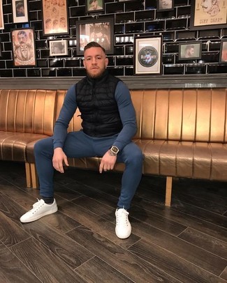 Conor McGregor wearing Black Quilted Gilet, Navy Turtleneck, Navy Sweatpants, White Leather Low Top Sneakers