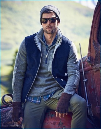 Blue Gilet Outfits For Men: Why not try pairing a blue gilet with grey chinos? Both of these pieces are totally functional and will look amazing paired together.