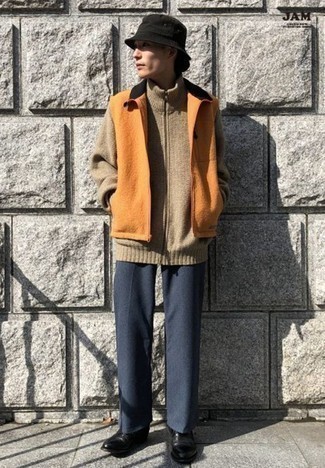 Bucket Hat Outfits For Men: Go for a pared down but at the same time casually stylish choice by combining an orange fleece gilet and a bucket hat. Add black leather chelsea boots to the mix for an extra touch of style.