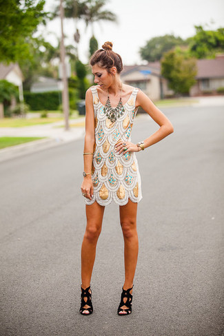 As you can see, looking classy doesn't take that much time. Wear a gold sequin shift dress and be sure you'll look incredibly stylish. Complete your look with a pair of black suede heeled sandals and the whole outfit will come together.