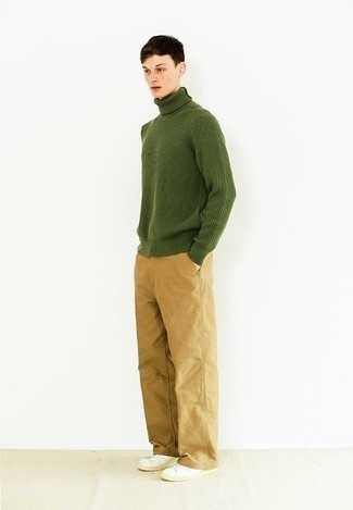 Tan Pants Outfits For Men: A green knit turtleneck and tan pants are the kind of casual must-haves that you can style a hundred of ways. On the fence about how to complement your ensemble? Rock white canvas low top sneakers to ramp it up.