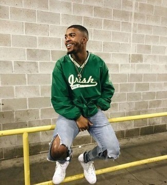 Green Windbreaker Outfits For Men: A green windbreaker and light blue ripped jeans are absolute essentials if you're piecing together a casual wardrobe that holds to the highest menswear standards. Inject an added touch of polish into this outfit with white canvas low top sneakers.