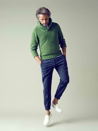 Green Sweater Outfits For Men: This outfit with a green sweater and navy chinos isn't super hard to score and is easy to change. Feeling transgressive today? Elevate this look with white canvas slip-on sneakers.