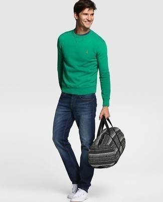 Green Sweater Outfits For Men: This pairing of a green sweater and navy jeans combines comfort and functionality and helps you keep it low-key yet current. Complete your getup with a pair of white canvas low top sneakers to easily boost the wow factor of any getup.