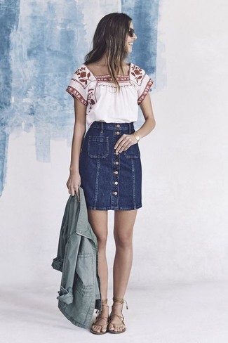 Anorak Outfits For Women: An anorak and a navy denim button skirt are indispensable staples if you're putting together a casual closet that holds to the highest fashion standards. Introduce a pair of brown leather gladiator sandals to the mix to switch things up.