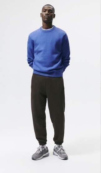 Men's White Socks, Grey Athletic Shoes, Dark Brown Sweatpants, Blue Crew-neck Sweater