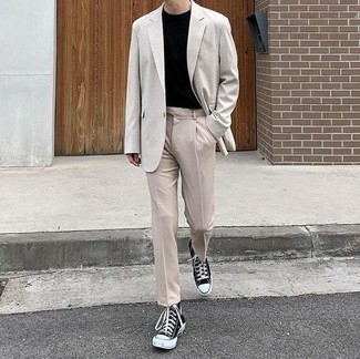 Grey Blazer Casual Outfits For Men: Marrying a grey blazer and beige chinos is a fail-safe way to infuse class into your closet. If you want to break out of the mold a little, complement this ensemble with black and white canvas high top sneakers.