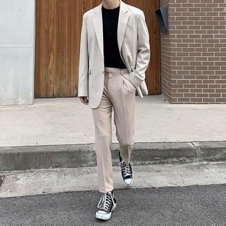 Beige Chinos Outfits: A grey blazer and beige chinos are an easy way to introduce some refinement into your current collection. Black and white canvas high top sneakers introduce a casual aesthetic to the look.