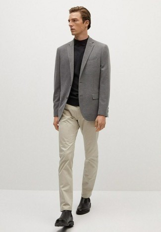 Beige Chinos Outfits: This combination of a grey wool blazer and beige chinos is really a statement-maker. Feeling bold today? Jazz things up by finishing with black leather chelsea boots.