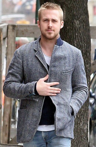 Ryan Gosling wearing Grey Wool Blazer, Black V-neck Sweater, White Crew-neck T-shirt, Blue Jeans