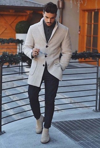 You'll be amazed at how super easy it is for any gent to pull together this casually sleek ensemble. Just a grey wool blazer and black chinos. Here's how to breathe a touch of class into this outfit: grey suede chelsea boots.