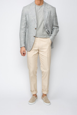 Grey Plaid Blazer Outfits For Men: A grey plaid blazer and beige chinos are a pairing that every sharp gentleman should have in his wardrobe. Feeling venturesome today? Shake up your outfit with a pair of beige suede slip-on sneakers.