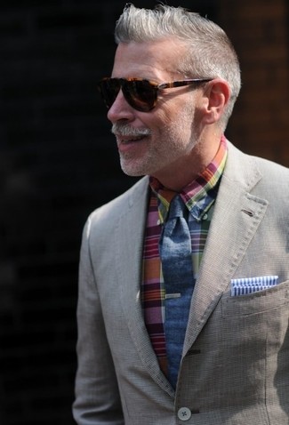 Nick Wooster wearing Grey Cotton Blazer, Multi colored Plaid Long Sleeve Shirt, Navy Tie, White and Blue Vertical Striped Pocket Square