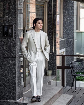 Grey Blazer Warm Weather Outfits For Men: As you can see, looking casually classic doesn't take that much effort. Marry a grey blazer with white chinos and you'll look amazing. To add a bit of flair to this look, add a pair of black leather tassel loafers to the equation.