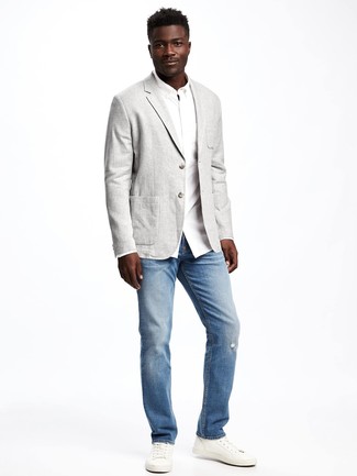 Charcoal Linen Blazer Outfits For Men: A charcoal linen blazer and light blue jeans will add extra style to your current routine. And it's a wonder how a pair of white leather low top sneakers can update an outfit.