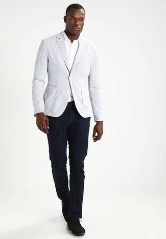 Grey Blazer Outfits For Men: For a look that's pared-down but can be dressed up or down in a myriad of different ways, try teaming a grey blazer with navy chinos. Dial down the casualness of this getup by slipping into a pair of black suede derby shoes.