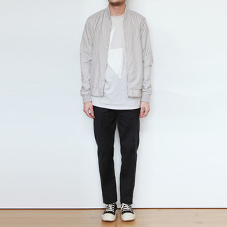 Black and White Leather High Top Sneakers Outfits For Men: A grey bomber jacket and black chinos have become indispensable casual staples for most guys. If you need to immediately tone down this ensemble with a pair of shoes, why not add a pair of black and white leather high top sneakers to the equation?