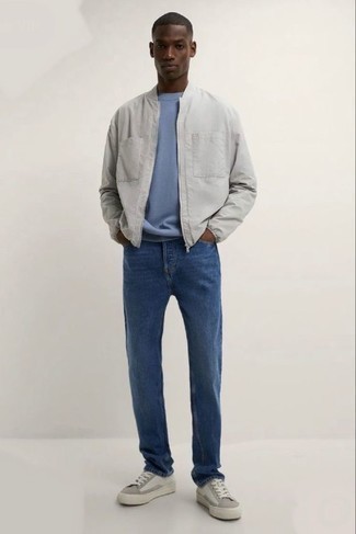 Light Blue Crew-neck T-shirt Outfits For Men: A light blue crew-neck t-shirt and navy jeans are a favorite pairing for many style-savvy guys. Complete your outfit with white leather low top sneakers and you're all done and looking incredible.