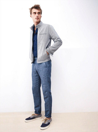 Blue Linen Dress Pants Outfits For Men: Combining a grey bomber jacket and blue linen dress pants is a fail-safe way to infuse your day-to-day wardrobe with some masculine refinement. For times when this look is too much, dial it down by sporting a pair of navy plimsolls.