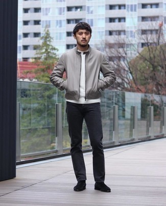 Black Jeans Outfits For Men: Display your prowess in men's fashion by wearing this relaxed casual pairing of a grey leather bomber jacket and black jeans. If you feel like stepping it up a bit, add black suede chelsea boots to the mix.