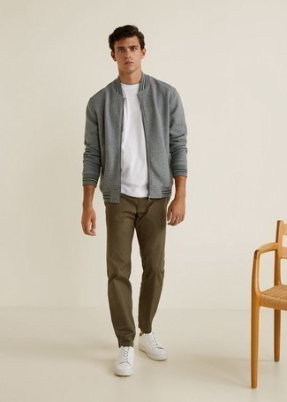 Grey Bomber Jacket Outfits For Men: The combination of a grey bomber jacket and olive chinos makes for a knockout relaxed casual ensemble. To bring a more relaxed touch to this outfit, introduce white canvas low top sneakers to this outfit.