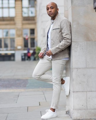 Grey Bomber Jacket Outfits For Men: A grey bomber jacket and white jeans are among the crucial elements in any gentleman's great casual wardrobe. White leather low top sneakers make this ensemble complete.