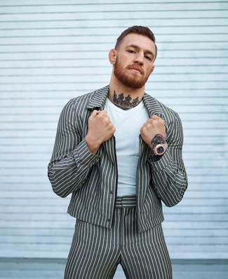 Conor McGregor wearing Grey Vertical Striped Bomber Jacket, White V-neck T-shirt, Grey Vertical Striped Dress Pants, Gold Watch