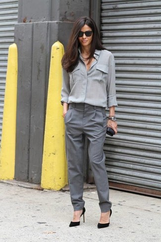 Grey Button Down Blouse Outfits: A grey button down blouse and charcoal dress pants are an easy way to introduce some refinement into your daily styling repertoire. Finish with black suede pumps and you're all set looking stunning.