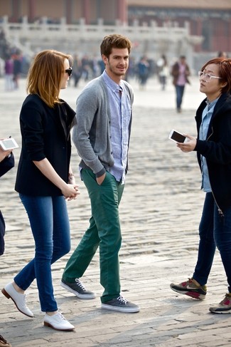 A grey cardigan and dark green chinos married together are a perfect match. Our favorite of a myriad of ways to round off this look is charcoal plimsolls.