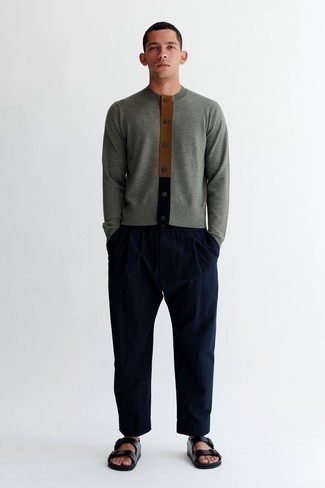 Grey Cardigan Outfits For Men: This combo of a grey cardigan and navy chinos is on the off-duty side but also ensures that you look dapper and incredibly sharp. Not sure how to finish off? Throw a pair of black leather sandals in the mix to shake things up.