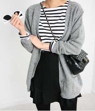 Grey Cardigan Outfits For Women: Combining a grey cardigan with a black skater skirt is an awesome option for a casual getup.