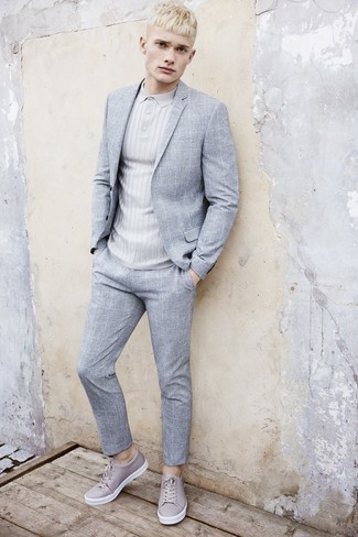Charcoal Polo Outfits For Men: Putting together a charcoal polo and a grey check suit is a surefire way to inject personality into your current wardrobe. For something more on the daring side to complement this look, add a pair of grey leather low top sneakers to the mix.