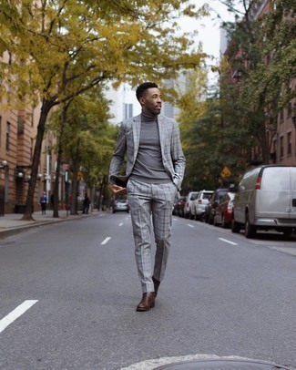 Grey Check Suit Outfits: Combining a grey check suit and a grey turtleneck is a fail-safe way to breathe rugged sophistication into your styling repertoire. Choose a pair of dark brown leather chelsea boots and the whole look will come together.