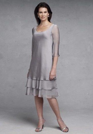 When the occasion calls for an elegant yet killer look, dress in a grey chiffon sheath dress. We love how complete this outfit looks when finished off by a pair of silver leather heeled sandals.