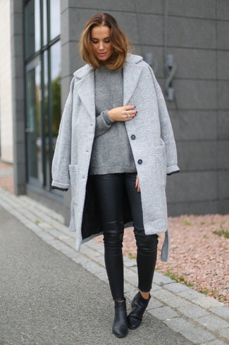 Black Leather Leggings Outfits: Why not try teaming a grey coat with black leather leggings? Both items are totally comfortable and will look cool together. A pair of black leather ankle boots immediately dresses up the look.