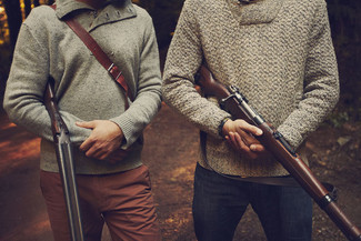Grey Cowl-neck Sweater Outfits For Men: This pairing of a grey cowl-neck sweater and tobacco chinos makes for the ultimate laid-back style for any modern gent.