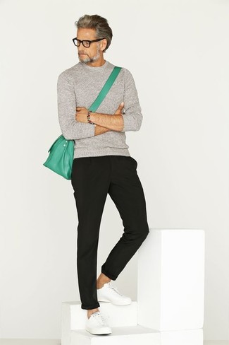 Men's Grey Crew-neck Sweater, Black Chinos, White Leather Low Top Sneakers, Green Leather Messenger Bag