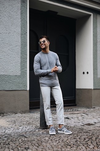 Silver Sunglasses Outfits For Men: This combination of a grey crew-neck sweater and silver sunglasses is super stylish and provides instant cool. Add grey canvas low top sneakers to your ensemble to shake things up.