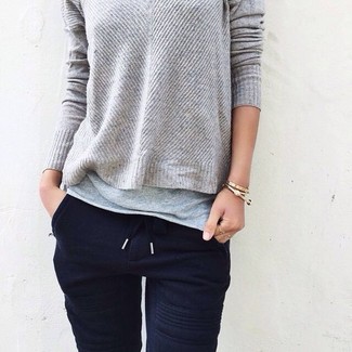 Charcoal T-shirt Outfits For Women: We say a big yes to this casual combination of a charcoal t-shirt and navy sweatpants!