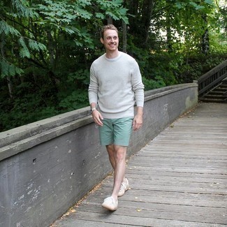 Mint Shorts Outfits For Men: To pull together a casual outfit with a modern spin, pair a grey crew-neck sweater with mint shorts. Introduce white canvas low top sneakers to your ensemble et voila, the ensemble is complete.