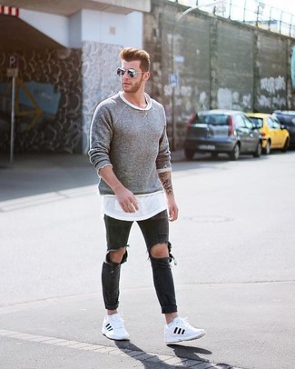 White Low Top Sneakers Outfits For Men: The go-to for a killer laid-back ensemble? A grey crew-neck sweater with black ripped skinny jeans. To give this outfit a sleeker finish, why not complete your outfit with a pair of white low top sneakers?