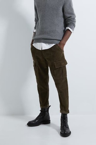 Tobacco Cargo Pants Outfits: This relaxed combination of a grey crew-neck sweater and tobacco cargo pants is very easy to throw together without a second thought, helping you look awesome and prepared for anything without spending a ton of time combing through your closet. Black leather casual boots are the most effective way to inject an added touch of refinement into your look.