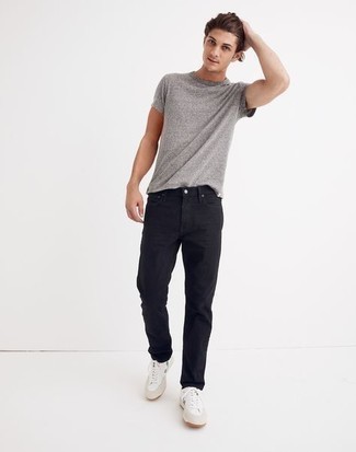 Grey Crew-neck T-shirt Outfits For Men: Fashionable and functional, this relaxed pairing of a grey crew-neck t-shirt and black jeans will provide you with variety. A pair of white and green canvas low top sneakers is a savvy pick to finish off your ensemble.
