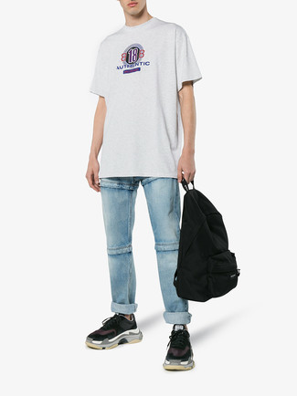 Men's Grey Print Crew-neck T-shirt, Light Blue Jeans, Black Athletic Shoes, Black Backpack
