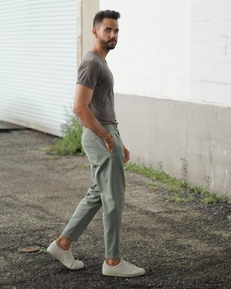 Green Chinos Outfits: Loving how well a grey crew-neck t-shirt teams with green chinos. When not sure about the footwear, stick to a pair of white canvas low top sneakers.