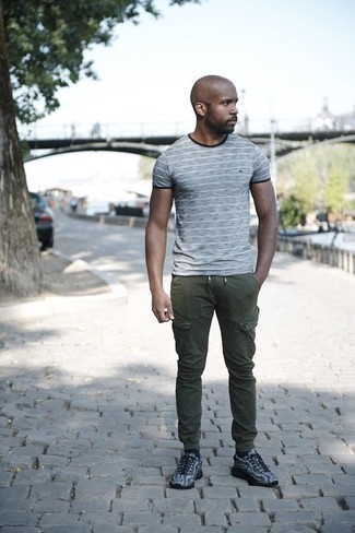 Olive Cargo Pants Outfits: Who said you can't make a style statement with an urban look? That's easy in a grey horizontal striped crew-neck t-shirt and olive cargo pants. If you need to effortlessly play down your look with shoes, why not add grey athletic shoes to the mix?