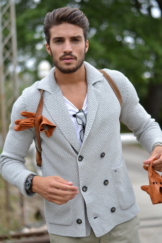 Double Breasted Cardigan Outfits For Men: A double breasted cardigan and grey chinos worn together are the perfect combination for those who love casual styles.